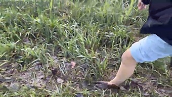 Walking Without Shoes In A Wet Marshland - Dirty Feet