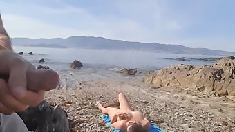 A Voyeuristic Encounter With A Nudist Milf And An Exhibitionist Man On The Beach